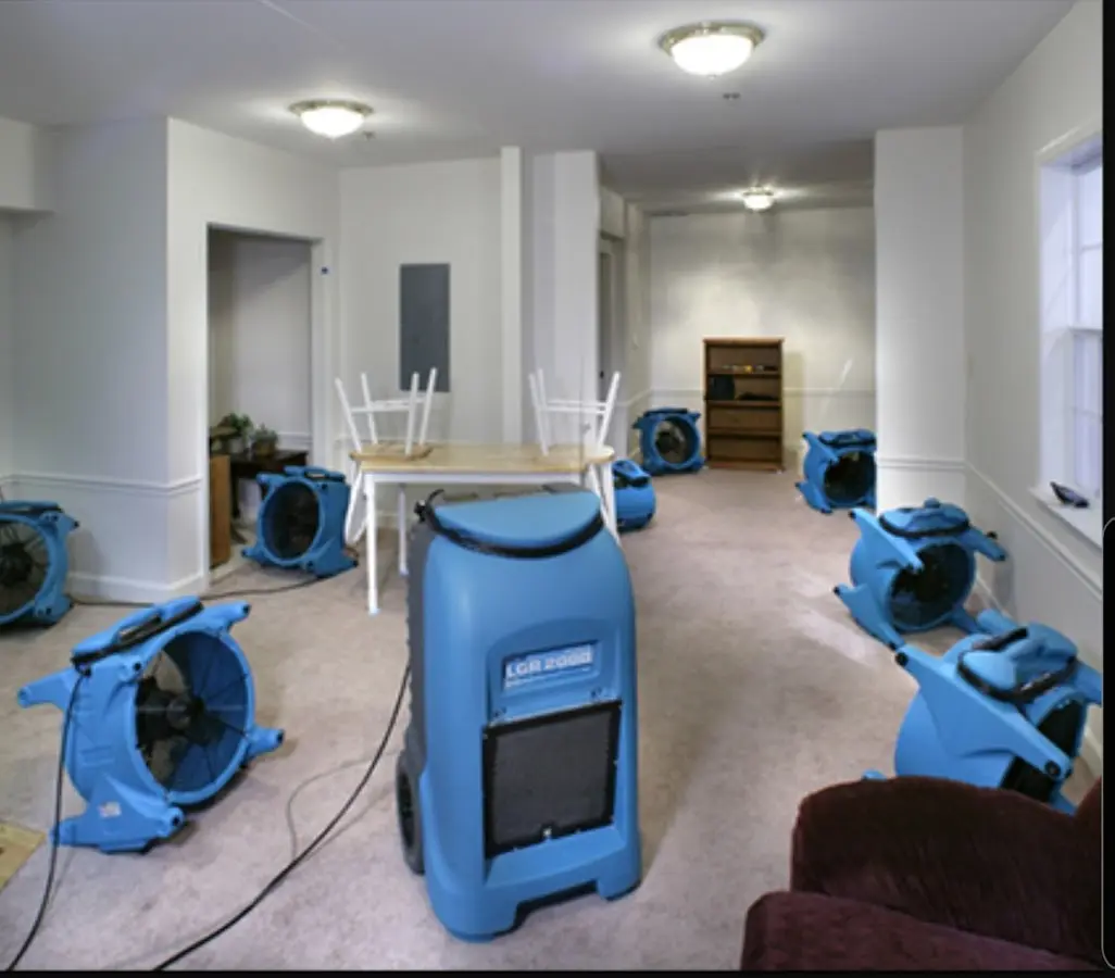 Air movers and dehumidifier setup for Water Damage Restoration in Chartiers